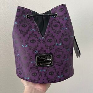 Disney parks haunted mansion loungefly glow in the dark